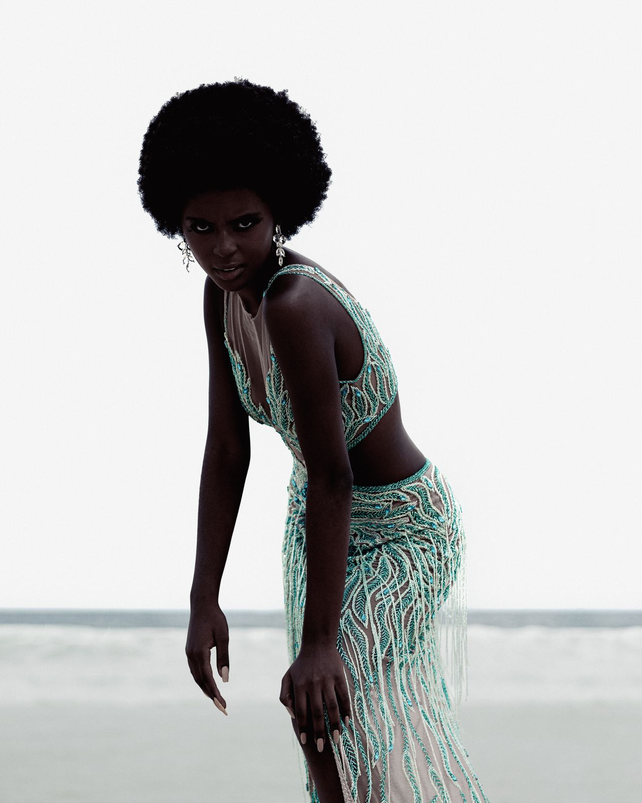 Model wearing an intricately embellished look