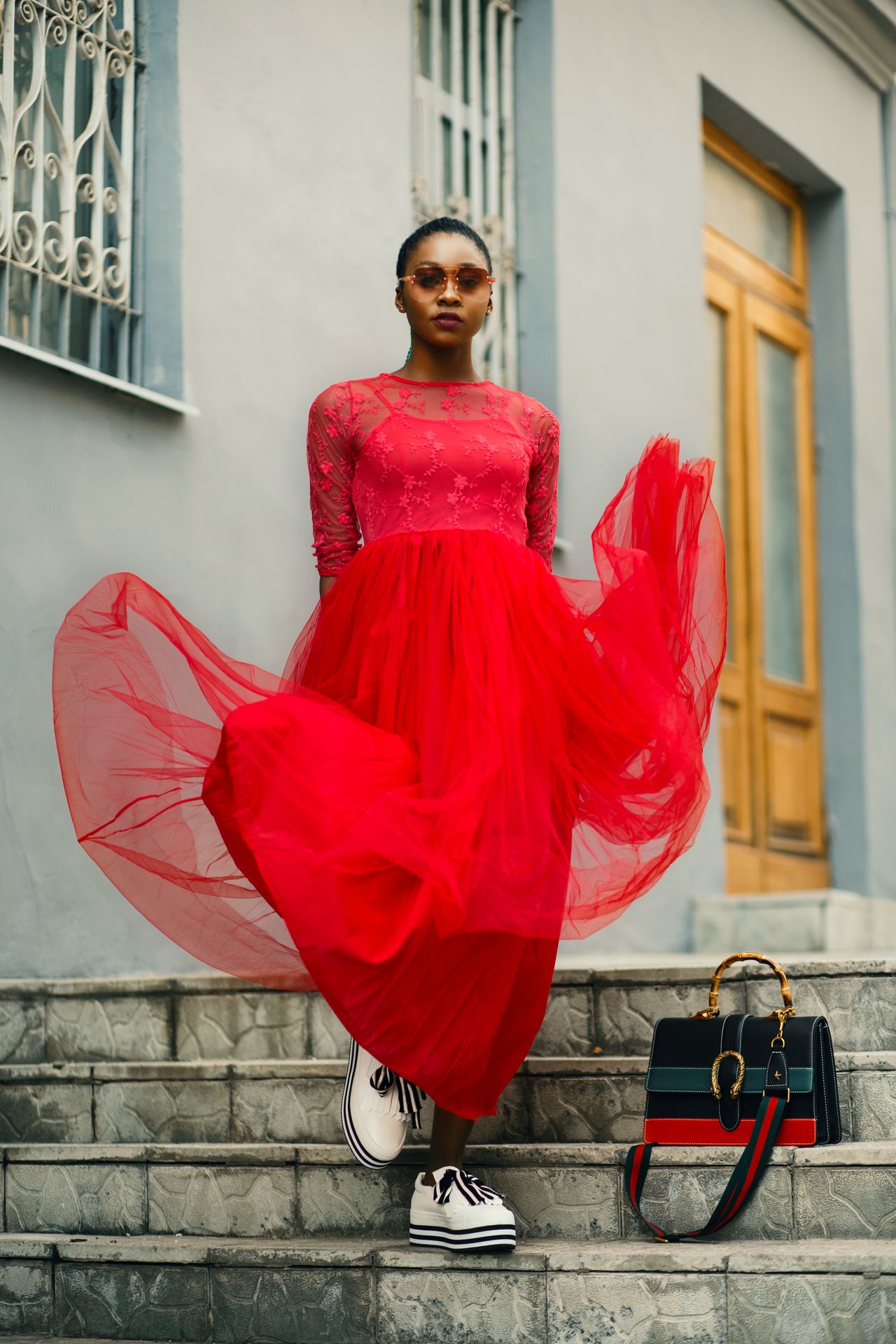 Aurelle fashion collection: a flowing scarlet dress with statement accessories